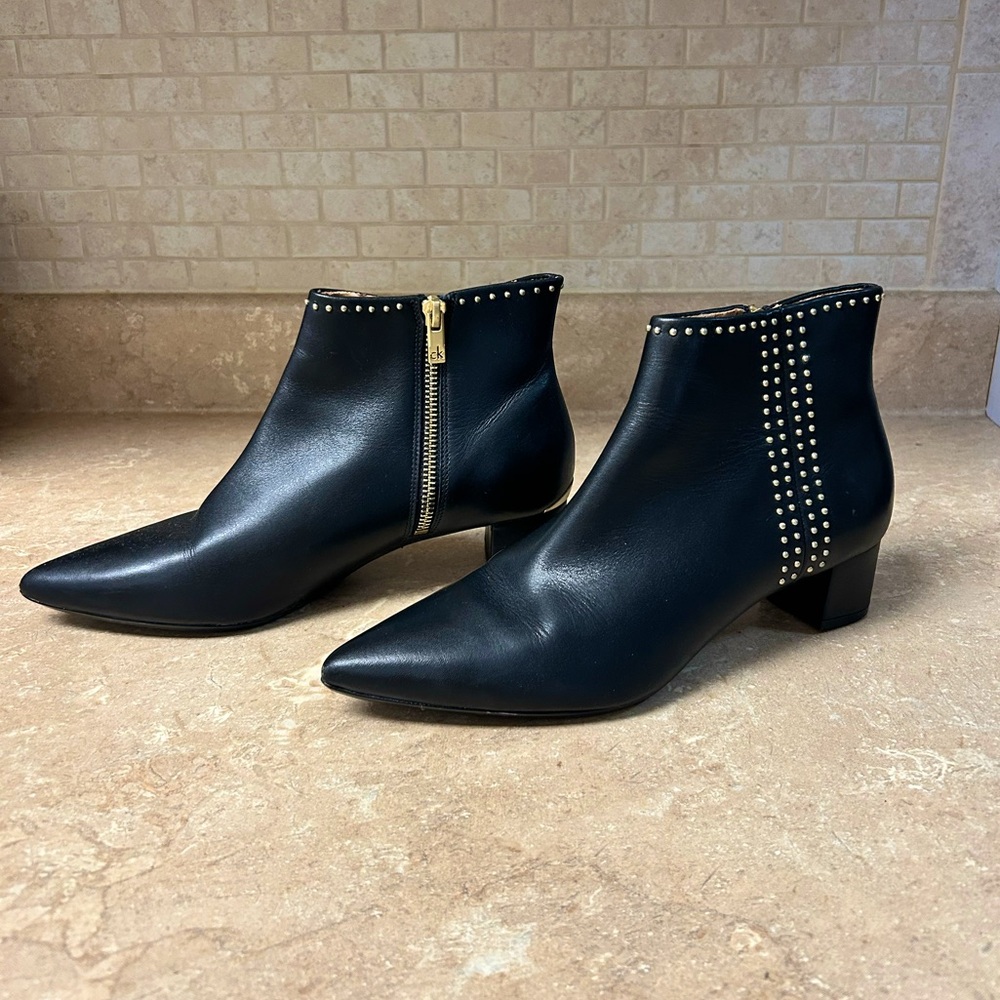 Calvin Klein gold accented ankle boots